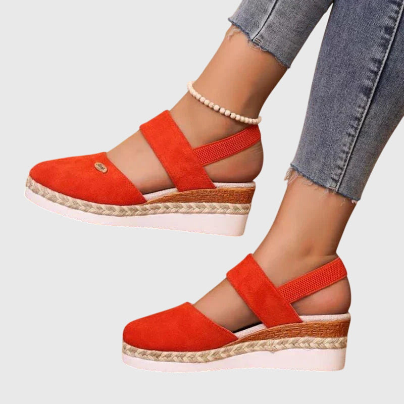 Beige Antonia™ ELUXOR orthopedic sandals by THE WHITMORE FAMILY, featuring supportive design and comfortable straps.
