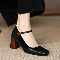 Brown Florence Classic Mary Janes flat sandals by THE WHITMORE FAMILY with rounded toes and ankle straps.