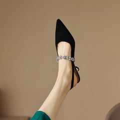 Silver THE WHITMORE FAMILY Isabelle casual flat sandals featuring elegant design and comfortable slip-on style.