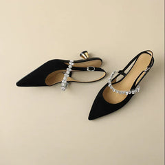 Silver THE WHITMORE FAMILY Isabelle flat sandals with elegant casual pump style, featuring a sleek design and comfortable fit.