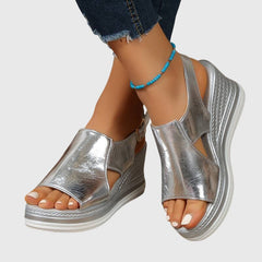Helen orthopedic sandals by THE WHITMORE FAMILY in gold with cushioned straps and supportive soles, suitable for comfortable everyday wear.