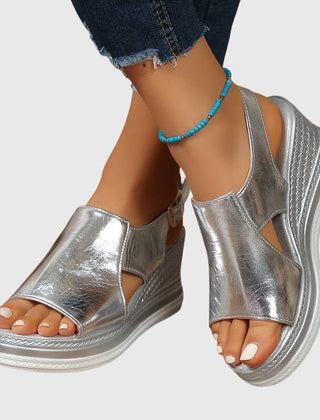 Helen orthopedic sandals by THE WHITMORE FAMILY in gold with cushioned straps and supportive soles, suitable for comfortable everyday wear.