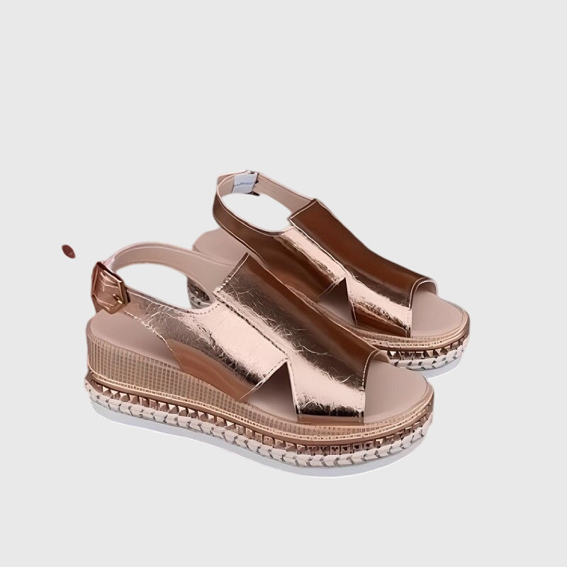Helen orthopedic sandals by THE WHITMORE FAMILY in gold with supportive soles and open-toe design.