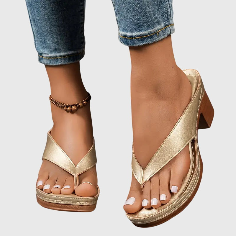 Gold Gianna™ orthopedic sandals by THE WHITMORE FAMILY featuring cushioned straps and supportive soles for comfortable wear.