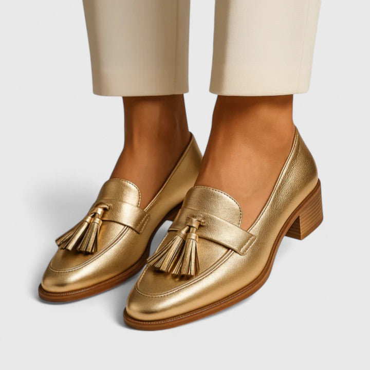 Gold Syrelle all-day comfort loafers by THE WHITMORE FAMILY, stylish leather slip-ons with cushioned insoles for everyday wear.