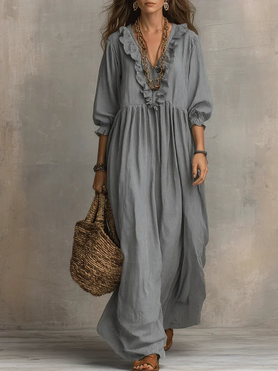Gray boho long sleeve maxi dress by THE WHITMORE FAMILY featuring flowing fabric and relaxed fit, perfect for casual or bohemian style.