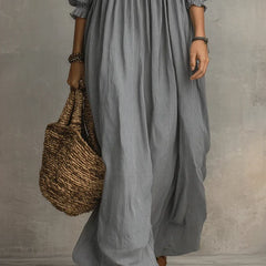 Gray Elowen boho long sleeve maxi dress from THE WHITMORE FAMILY, flowing fabric and bohemian style, full-length view.