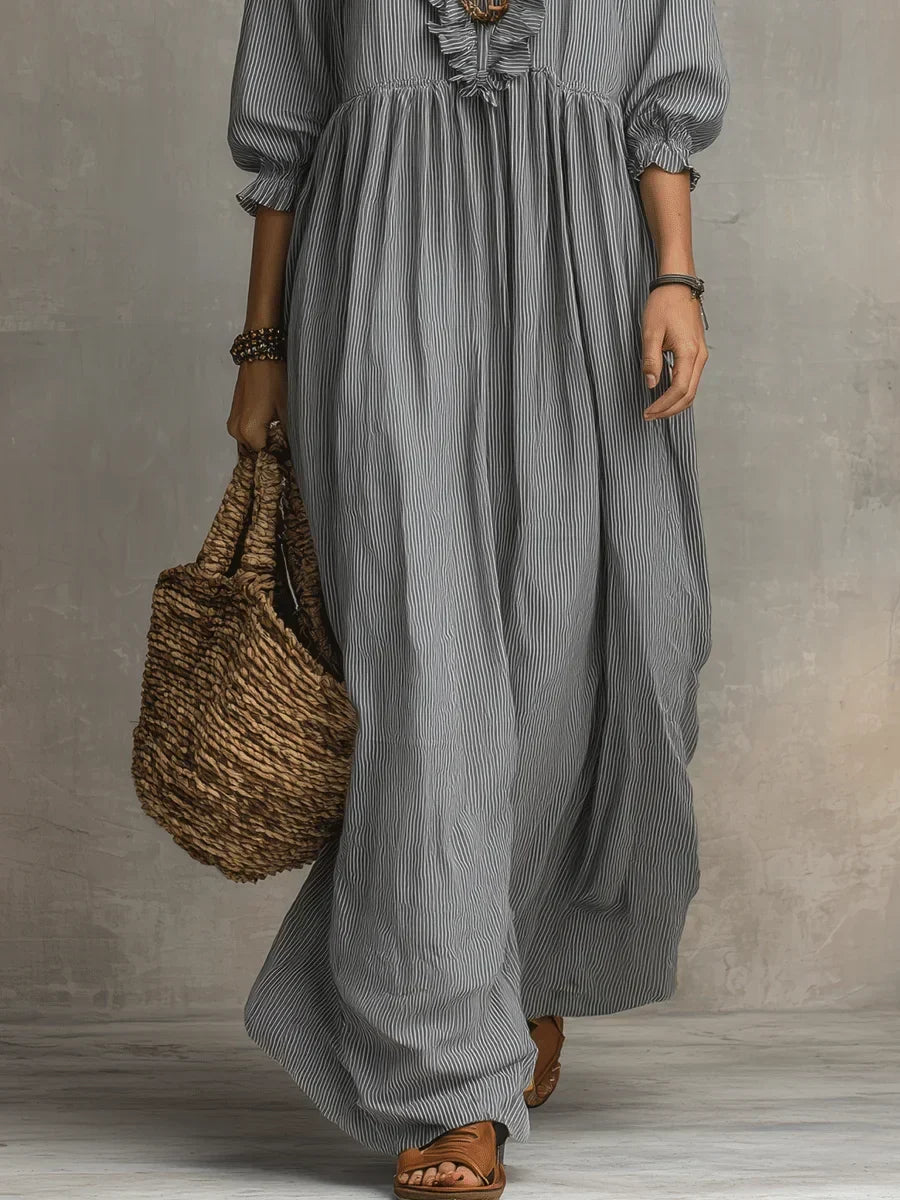 Gray Elowen boho long sleeve maxi dress from THE WHITMORE FAMILY, flowing fabric and bohemian style, full-length view.