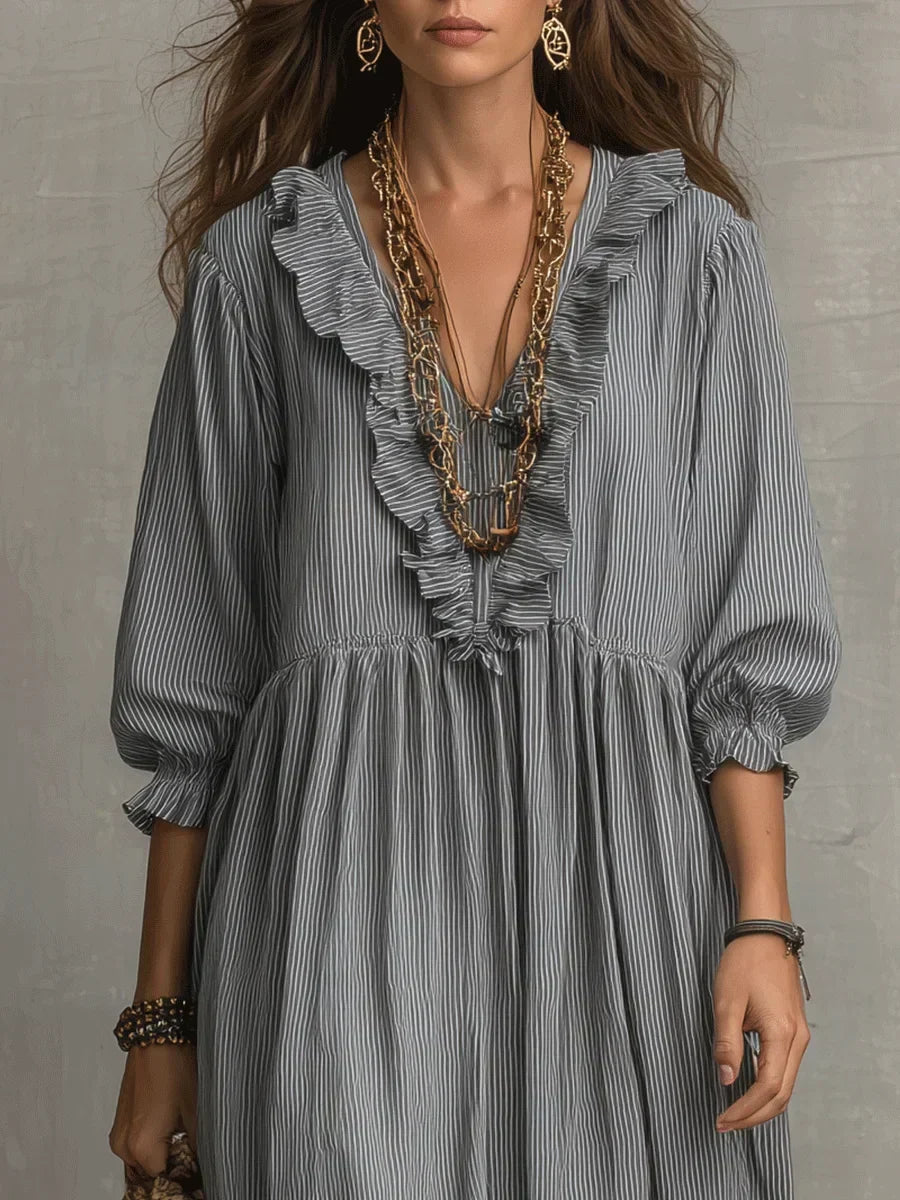 Gray boho long sleeve maxi dress by THE WHITMORE FAMILY, featuring a flowing silhouette and relaxed style.