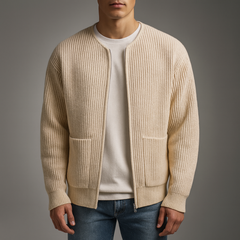 Gray Owen™ Knit Zip Cardigan by THE WHITMORE FAMILY, featuring a cozy knit fabric and a front zipper, shown on a model.