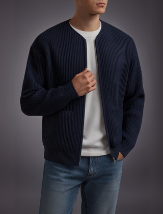 Gray Owen™ Knit Zip Cardigan by THE WHITMORE FAMILY, shown with front zipper, ribbed cuffs, and soft knit fabric.