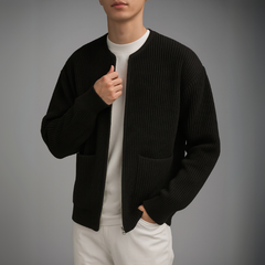 Gray Owen™ Knit Zip Cardigan by THE WHITMORE FAMILY, featuring a cozy knit fabric and front zipper, worn open or zipped up.