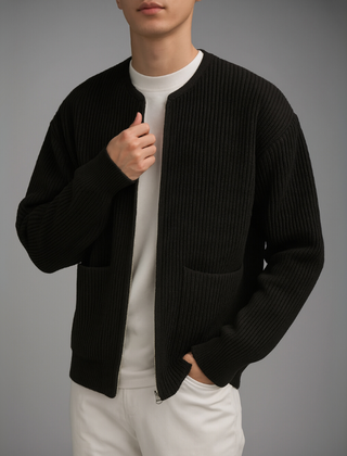 Gray Owen™ Knit Zip Cardigan by THE WHITMORE FAMILY, featuring a cozy knit fabric and front zipper, worn open or zipped up.