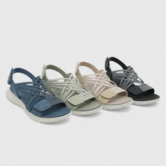 Green Arvienne™ orthopedic sandals by THE WHITMORE FAMILY with cushioned straps and supportive sole for comfortable walking.