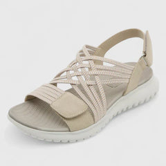 Green Arvienne™ orthopedic sandals by THE WHITMORE FAMILY with cushioned straps and supportive sole, designed for comfort and style.