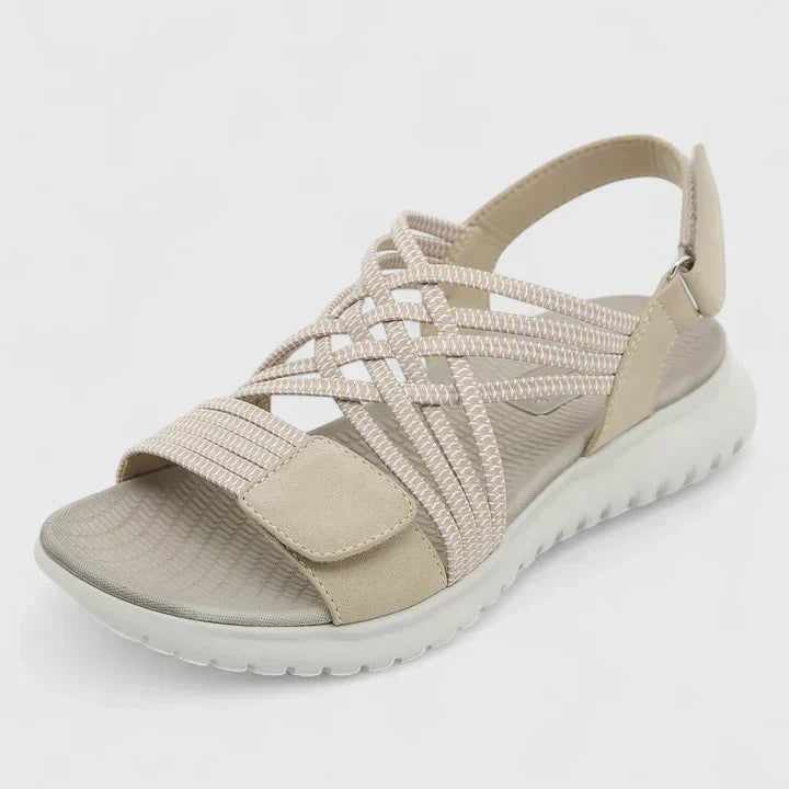 Green Arvienne™ orthopedic sandals by THE WHITMORE FAMILY with cushioned straps and supportive sole, designed for comfort and style.