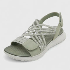 Green Arvienne™ orthopedic sandals by THE WHITMORE FAMILY featuring supportive footbed and adjustable straps.