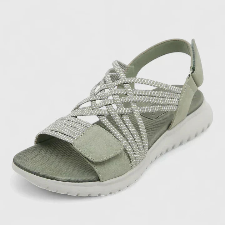 Green Arvienne™ orthopedic sandals by THE WHITMORE FAMILY featuring supportive footbed and adjustable straps.