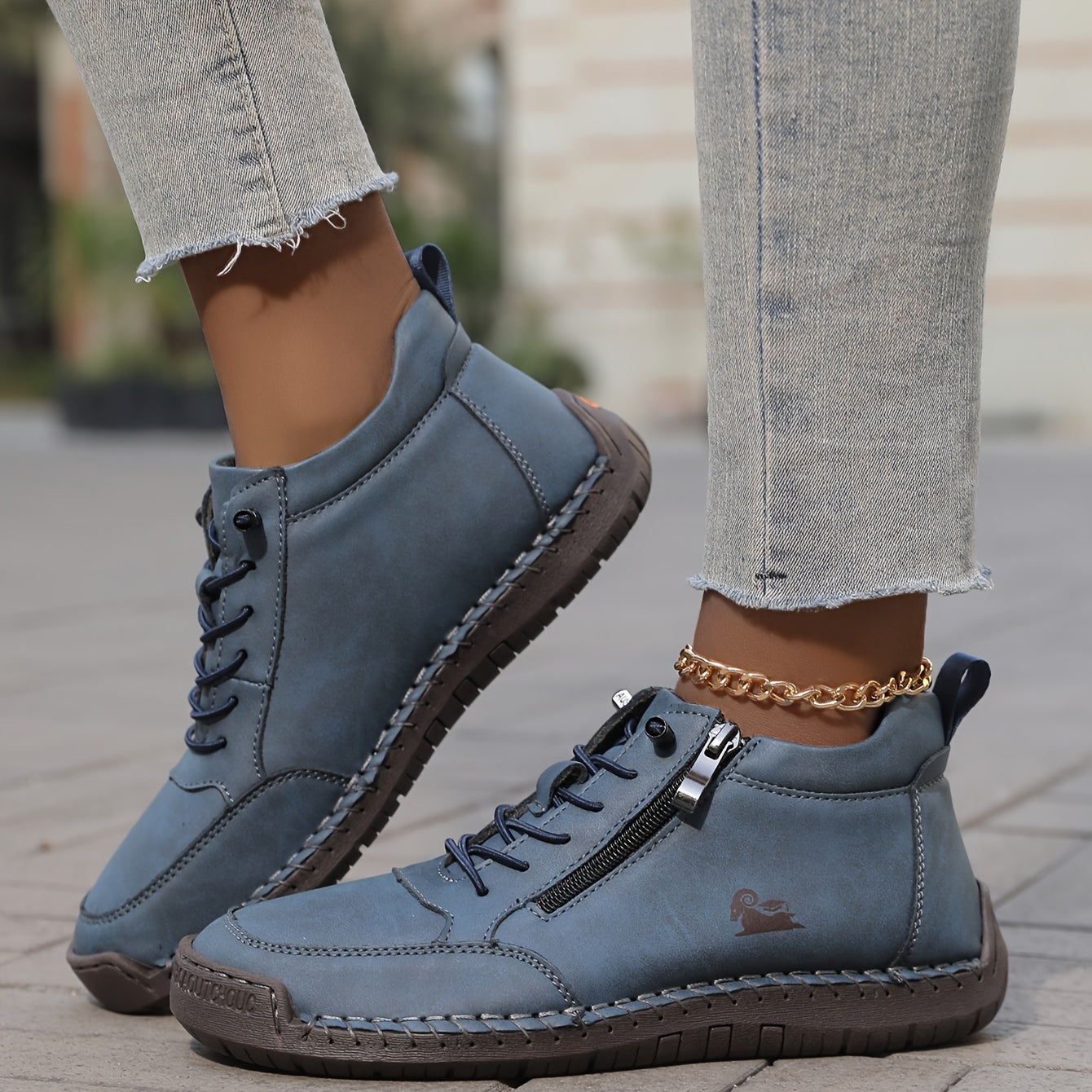 Green Émy™ ergonomic support sneakers by THE WHITMORE FAMILY, featuring cushioned soles and breathable material for comfortable wear.