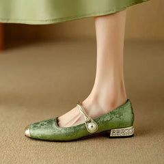 Green Mestelle Elegant Mary Janes by THE WHITMORE FAMILY featuring classic design and smooth leather straps.