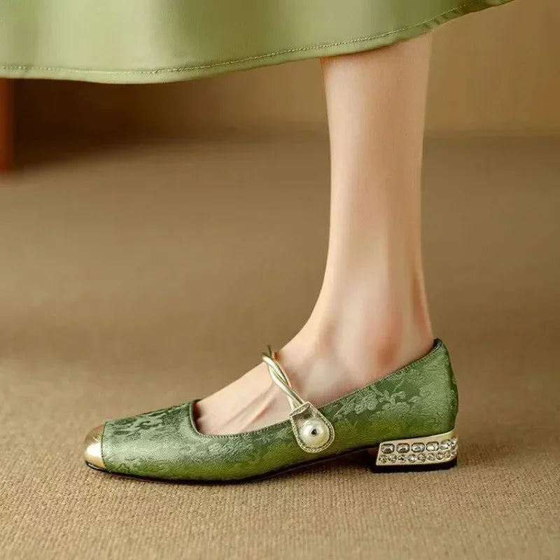 Green Mestelle Elegant Mary Janes by THE WHITMORE FAMILY featuring classic design and smooth leather straps.