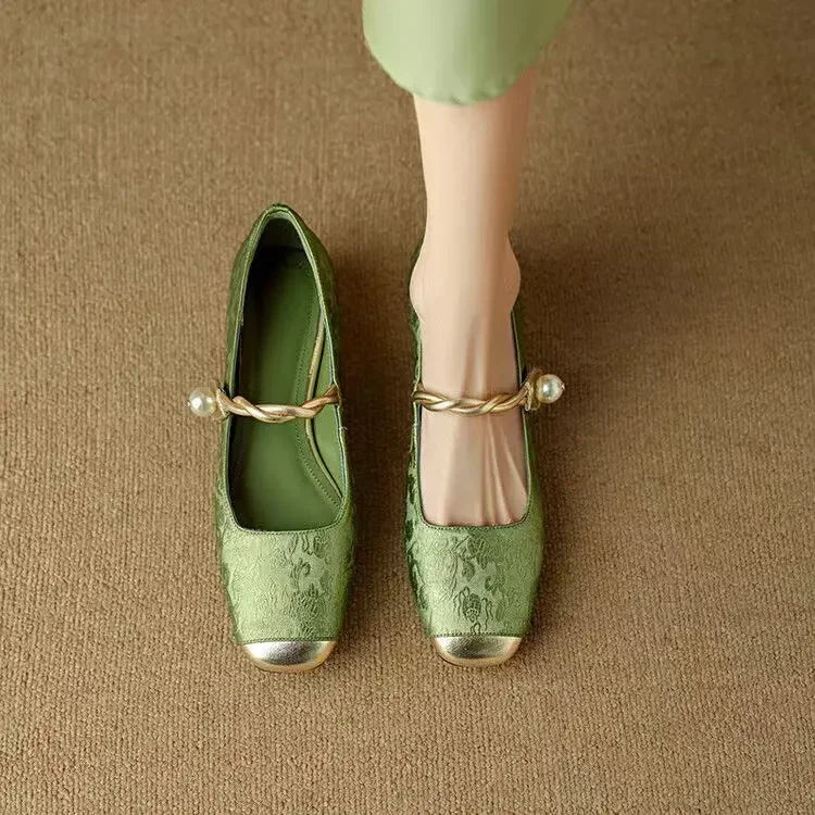 Green Mestelle Elegant Mary Janes by THE WHITMORE FAMILY featuring classic design and comfortable fit, perfect for stylish everyday wear.