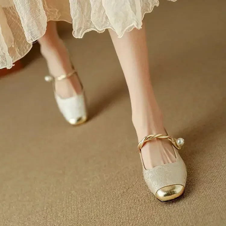 Green Mestelle Elegant Mary Janes by THE WHITMORE FAMILY featuring stylish leather straps and a classic, polished design.