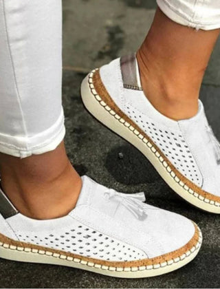 Green Arden™ Orthoflex Slip-Ons by THE WHITMORE FAMILY, showcasing comfortable slip-on shoes with flexible sole design.