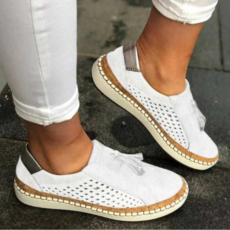Green Arden™ Orthoflex Slip-Ons by THE WHITMORE FAMILY, showcasing comfortable slip-on shoes with flexible sole design.