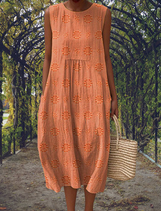 Green Aikaterini sleeveless dress with pockets by THE WHITMORE FAMILY, featuring a stylish and elegant design.