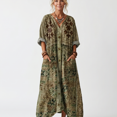 Green Aleta button-front oversized pocket midi dress by THE WHITMORE FAMILY, featuring a relaxed fit and stylish front pockets.