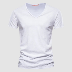 Green Burnet™ Cotton Summer Tee by THE WHITMORE FAMILY displayed on a plain background. Soft cotton fabric and casual fit.
