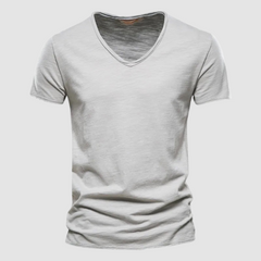 Green Burnet™ Cotton Summer Tee by THE WHITMORE FAMILY, casual short-sleeve shirt displayed on a plain background.