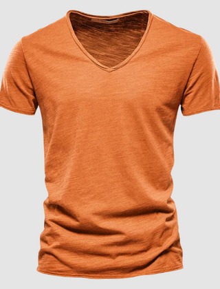 Green Burnet™ Cotton Summer Tee by THE WHITMORE FAMILY displayed on a model, showcasing a casual, lightweight t-shirt for warm weather.
