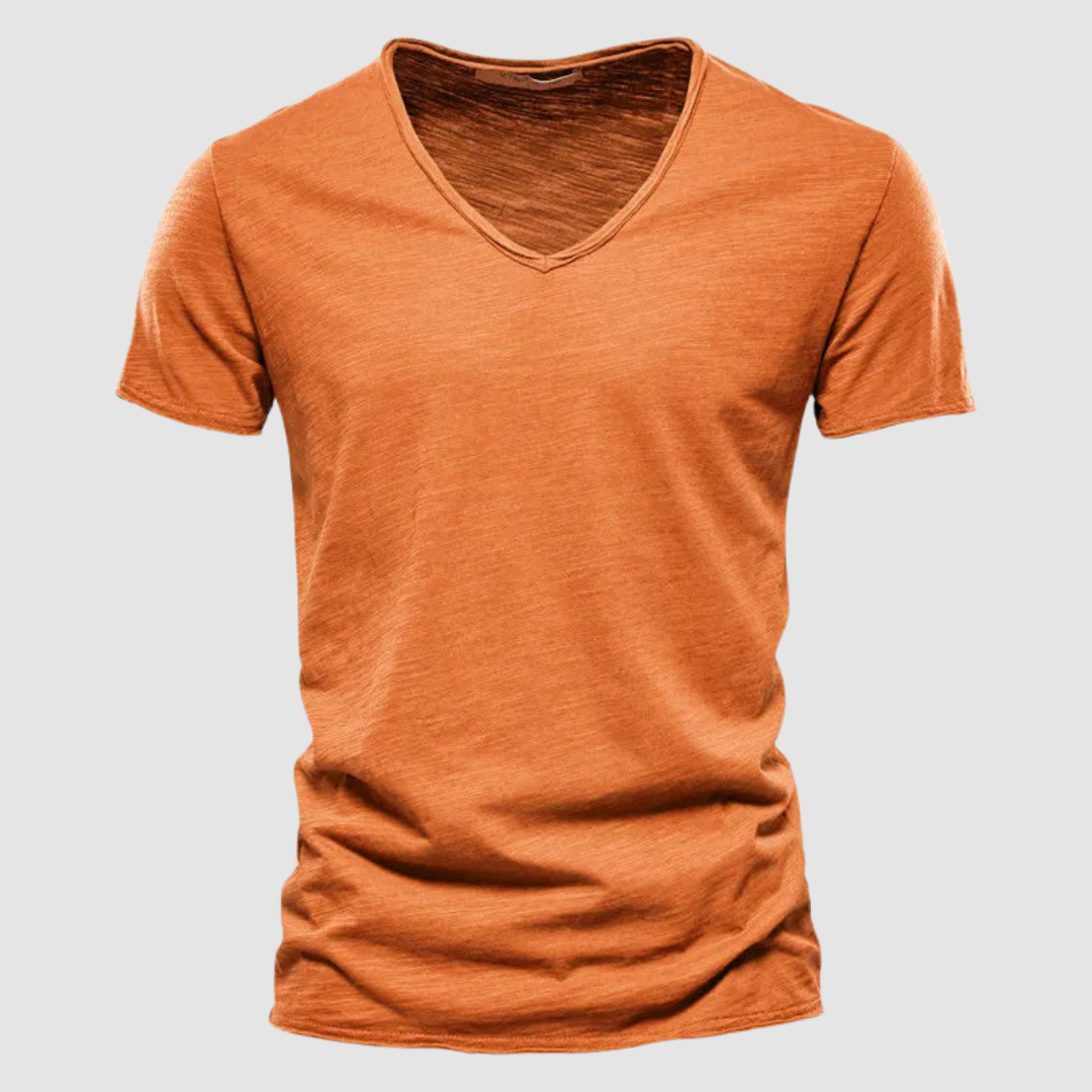 Green Burnet™ Cotton Summer Tee by THE WHITMORE FAMILY displayed on a model, showcasing a casual, lightweight t-shirt for warm weather.