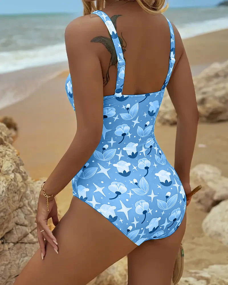 Green Clara™ printed tankini from THE WHITMORE FAMILY featuring a stylish one-piece design with vibrant print details.