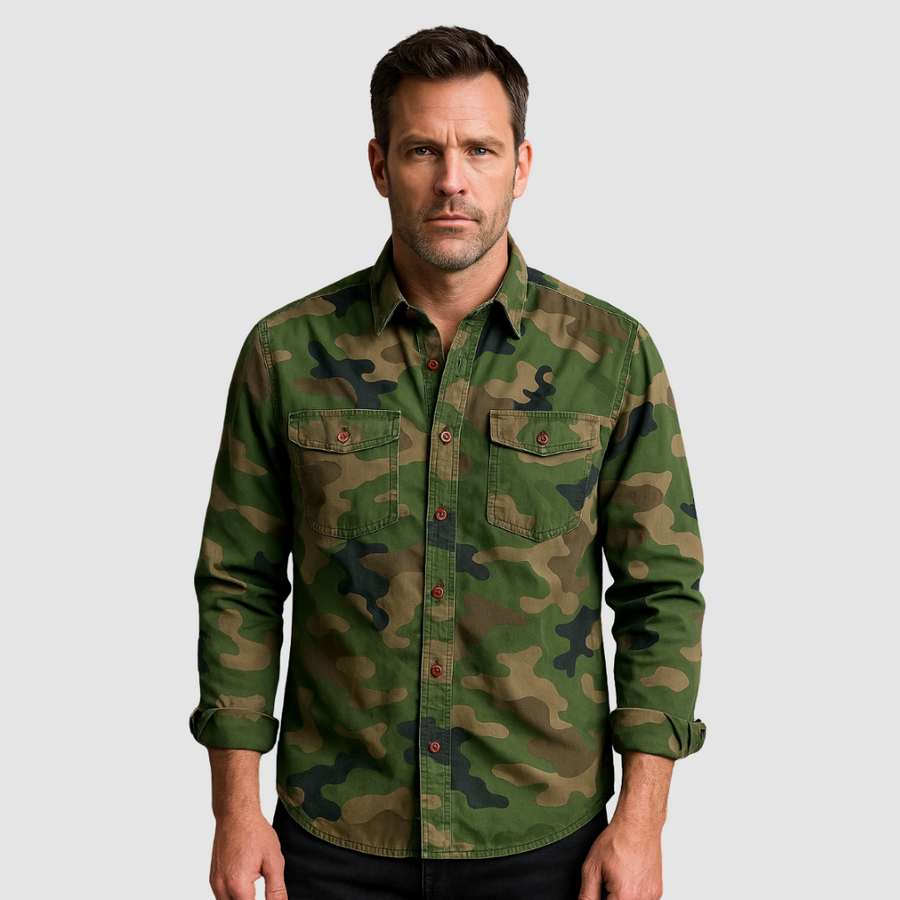 Logan™ Urban Camo Shirt by THE WHITMORE FAMILY, featuring a stylish camouflage pattern and casual fit, displayed on a hanger.