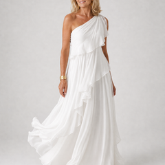 Victoria elegant maxi dress by The Whitmore Family, flowing fabric, fitted waist, and stylish neckline on a model.