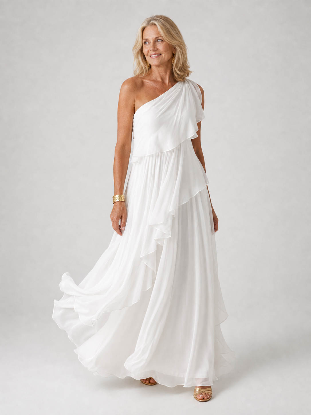 Victoria elegant maxi dress by The Whitmore Family, flowing fabric, fitted waist, and stylish neckline on a model.