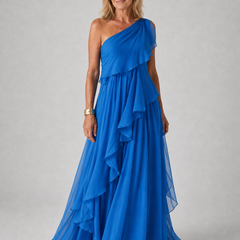 Elegant VICTORIA maxi dress by THE WHITMORE FAMILY, flowing fabric, fitted waist, and detailed neckline, perfect for formal occasions.