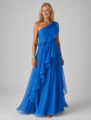 Elegant VICTORIA maxi dress by THE WHITMORE FAMILY, flowing fabric, fitted waist, and detailed neckline, perfect for formal occasions.
