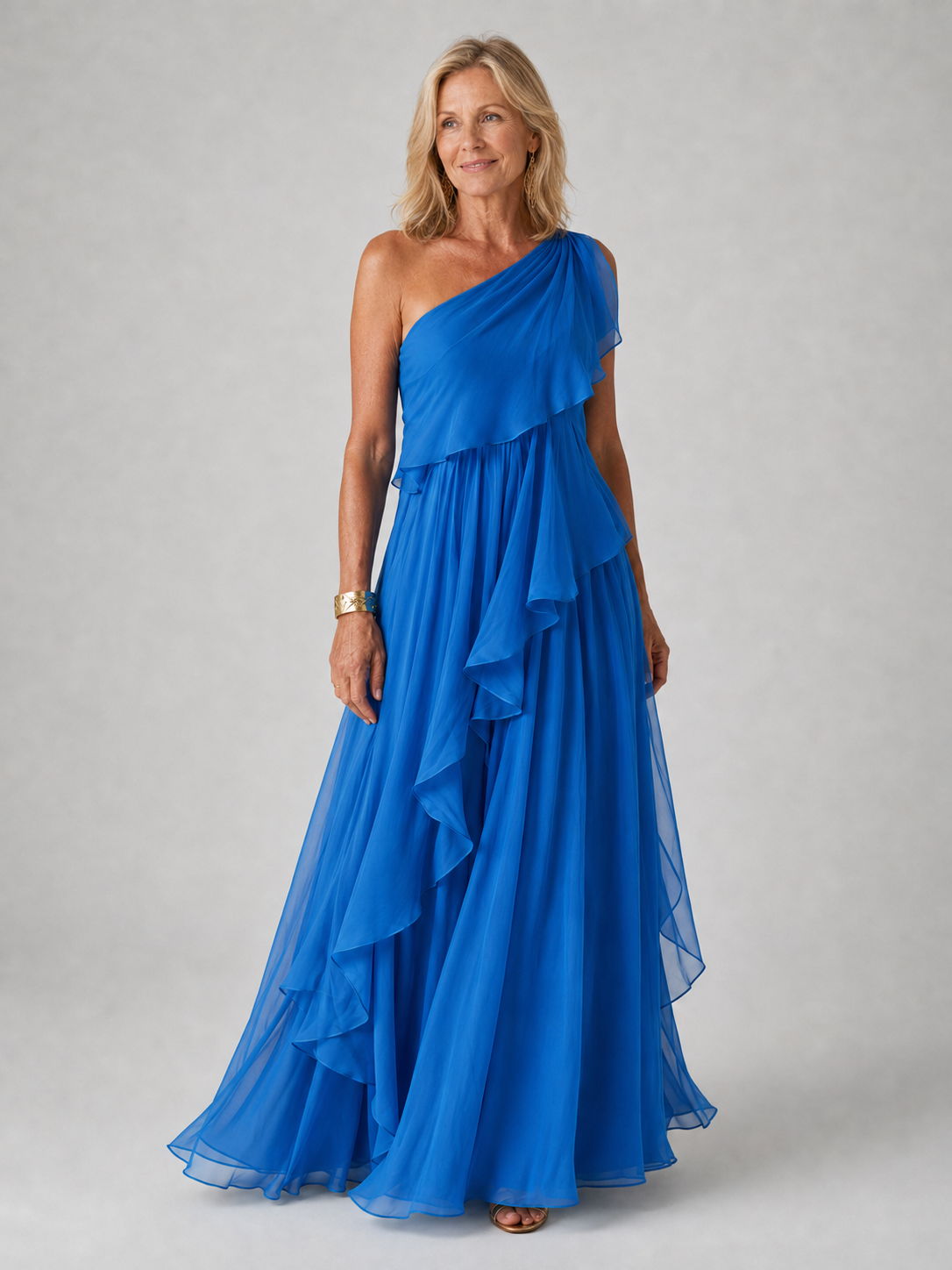 Elegant VICTORIA maxi dress by THE WHITMORE FAMILY, flowing fabric, fitted waist, and detailed neckline, perfect for formal occasions.