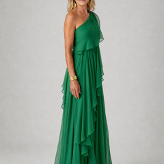 Elegant Victoria maxi dress by The Whitmore Family, featuring flowing fabric and a stylish design, perfect for formal occasions.