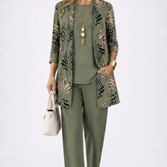Elegant three-piece trouser set by The Whitmore Family featuring a stylish top, matching trousers, and a coordinating jacket.