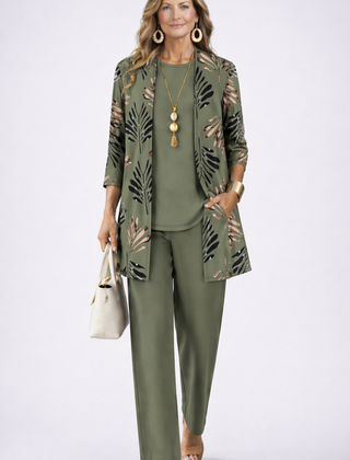 Elegant three-piece trouser set by The Whitmore Family featuring a stylish top, matching trousers, and a coordinating jacket.