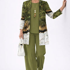 Elegant three-piece trouser set by The Whitmore Family featuring tailored pants, a matching blazer, and a stylish top.