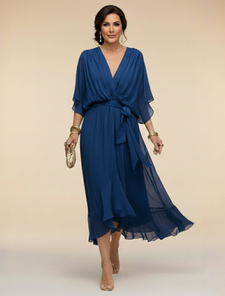 Green Sarah Sandra chiffon V-neck dress by THE WHITMORE FAMILY, lightweight fabric and elegant design, front view.