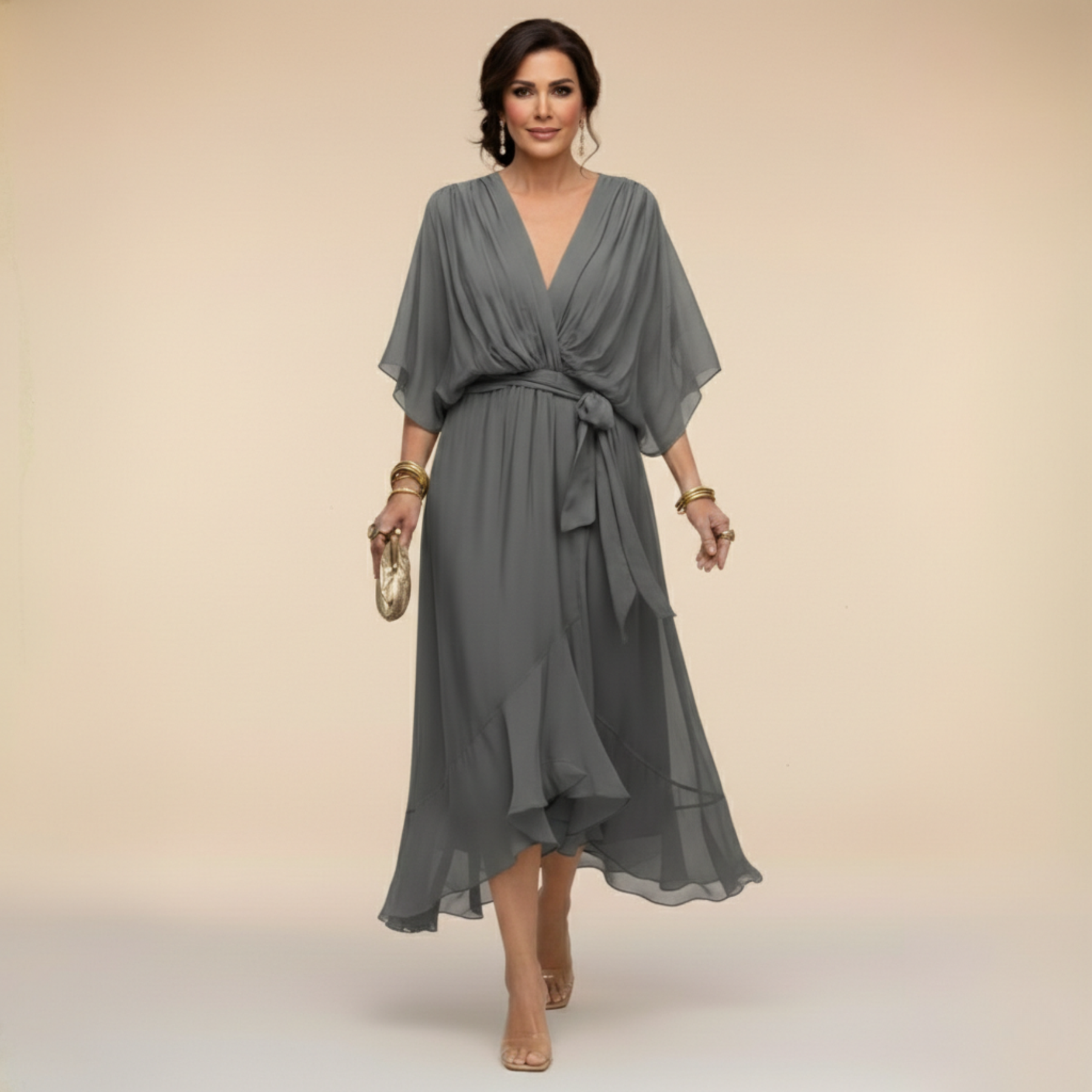 Green Sandra chiffon V-neck dress by THE WHITMORE FAMILY, featuring a flowy fit and elegant design.