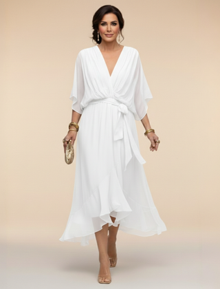 Green Sarah Sandra chiffon V-neck dress by THE WHITMORE FAMILY, lightweight fabric, sleeveless design, perfect for elegant occasions.