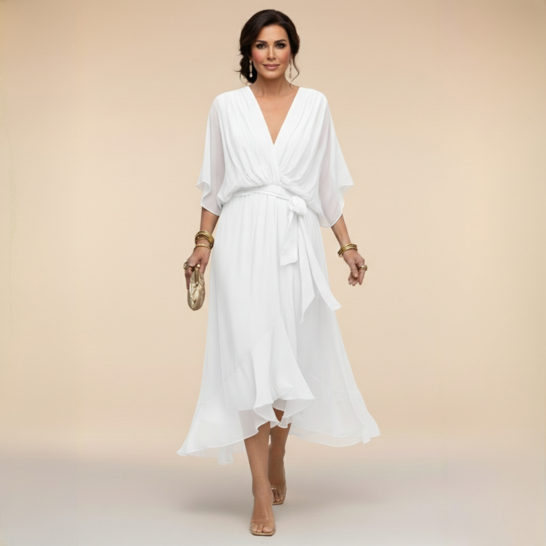 Green Sarah Sandra chiffon V-neck dress by THE WHITMORE FAMILY, lightweight fabric, sleeveless design, perfect for elegant occasions.